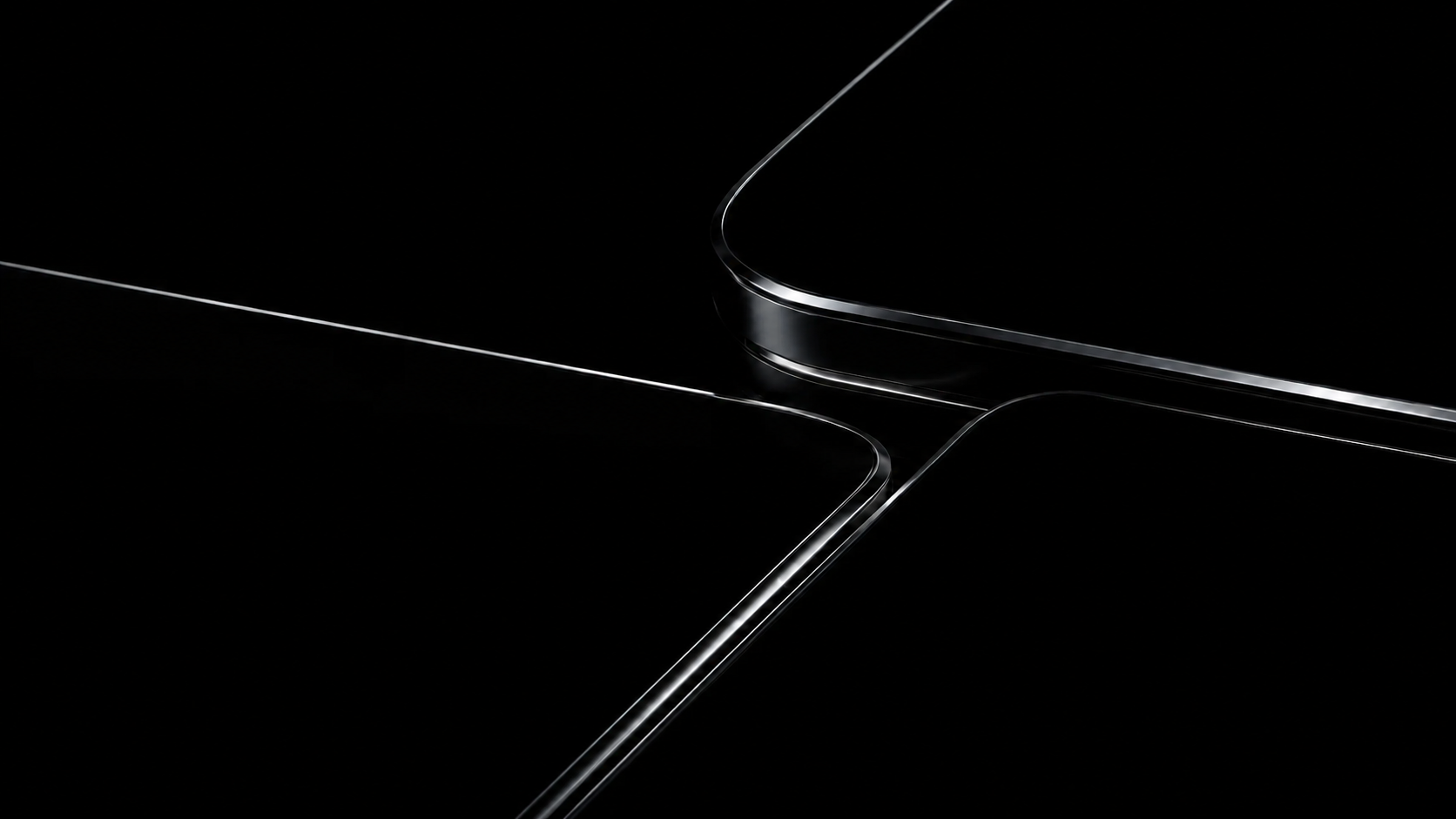 Polished planes crossing, a single lit edge running between them